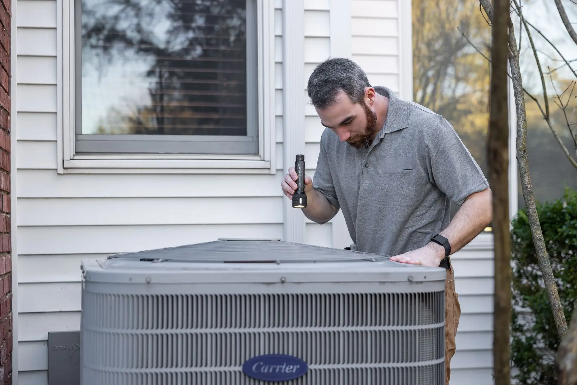 Why is my AC blowing smoke from a vent in a Port St Lucie Florida home